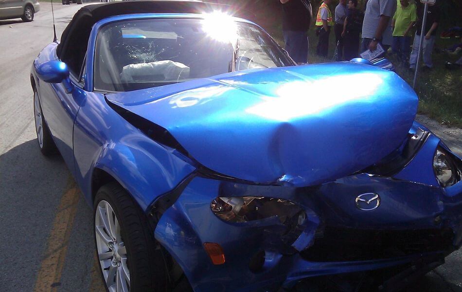 Blue car accident.